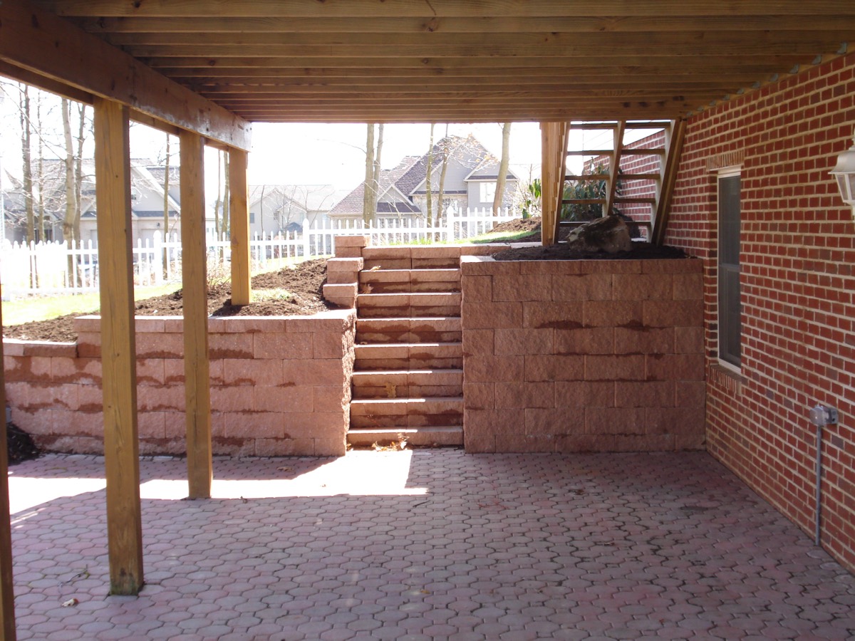 Paver patio with a retaining wall